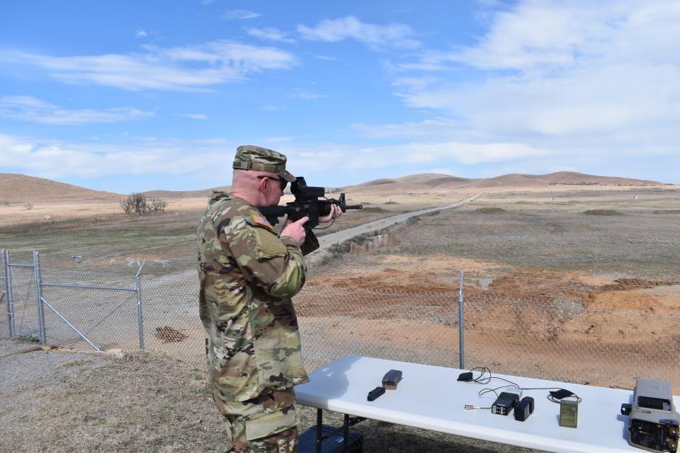 A Wisconsin National Guardsman takes aim with a Smart Shooter.