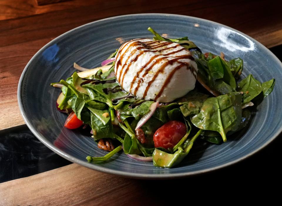 Burrata salad in a peanut butter vinaigrette from Stone Bar & Kitchen on the Northwest Side