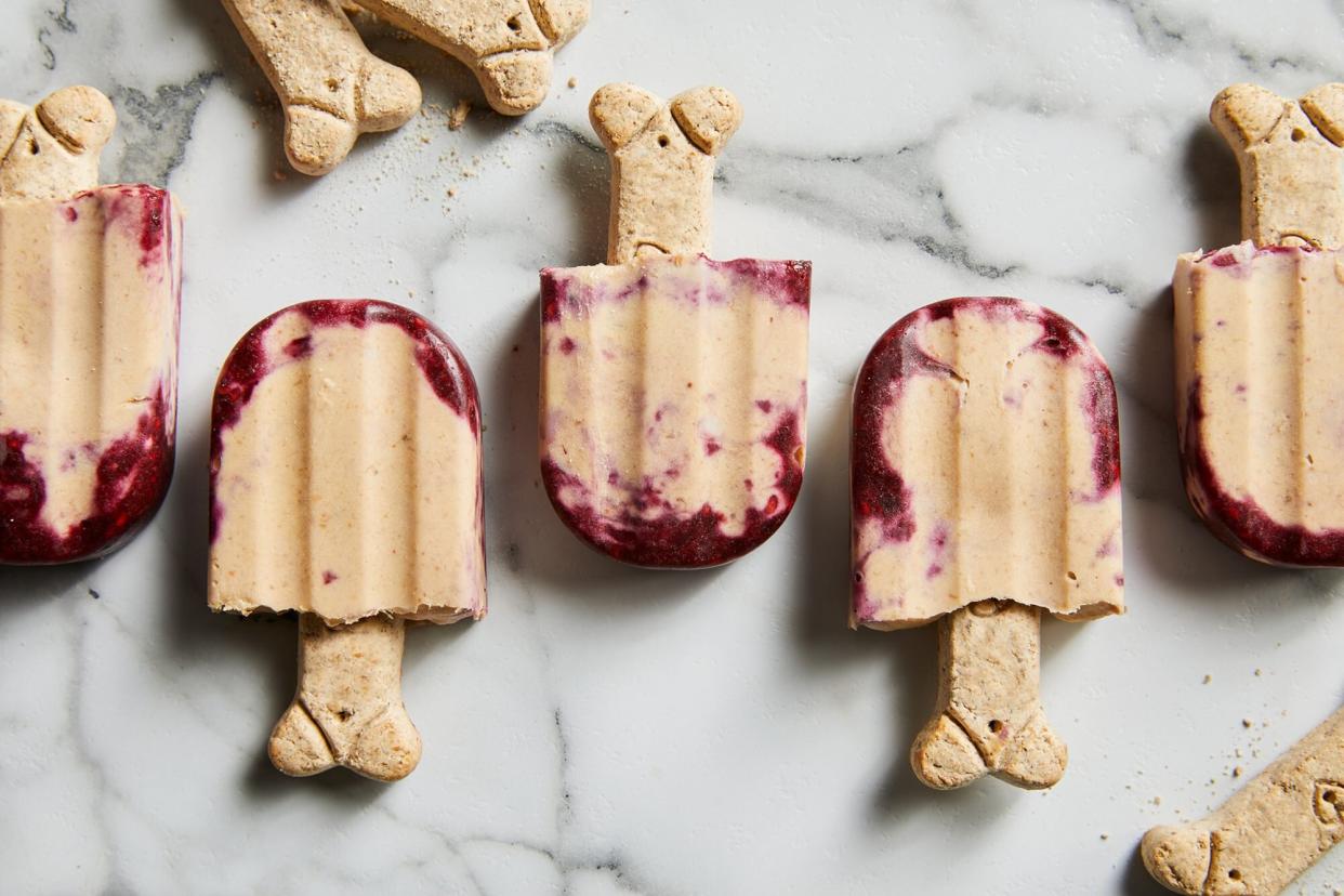 peanut butter blackberry dog popsicles with milkbone treats