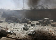 <p>Damaged cars are seen after a blast at the site of the incident in Kabul, Afghanistan May 31, 2017. (Omar Sobhani/Reuters) </p>