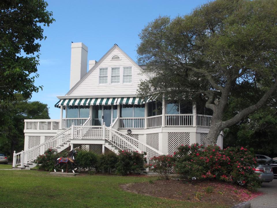 This May 22, 2013 photo shows the Franklin Burroughs-Simeon Chapin Art Museum in Myrtle Beach, S.C. Part of the structure is an almost 90-year-old beach house moved to its present location at the south end of the city about three decades ago. The museum has 10 galleries and an art studio. (AP Photo/Bruce Smith)