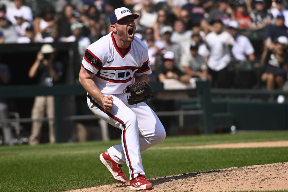 Chicago White Sox relief pitcher Liam Hendriks reacts after striking out Cleveland Indians' Oscar Mercado during the ninth inning of a baseball game, Sunday, Aug. 1, 2021, in Chicago. (AP Photo/Matt Marton)