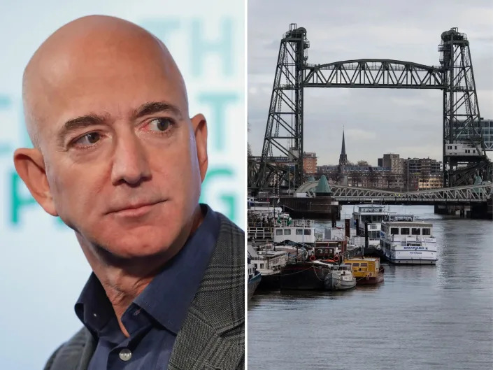 Jeff Bezos looks to side next to image of the Hef bridge in Rotterdam, Netherlands