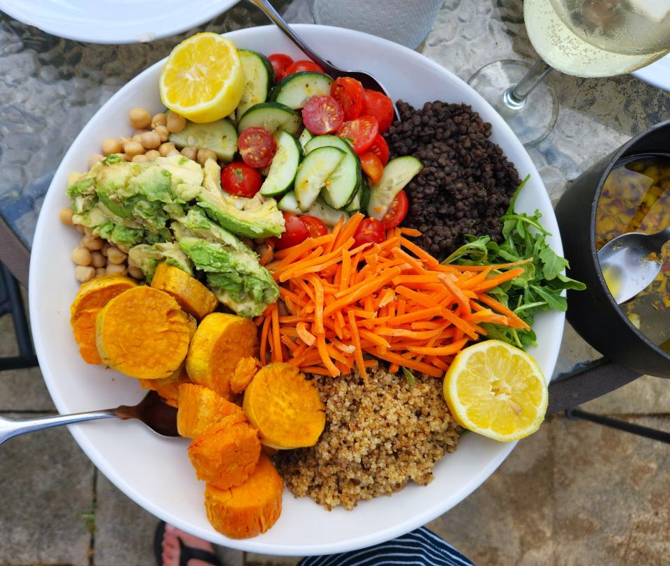 Our grain bowl contained quinoa, chick peas, lentils, a tomato and cucumber salad, roasted sweet potatoes, avocado, arugula and garlic and chile oil with lemon for squeezing.