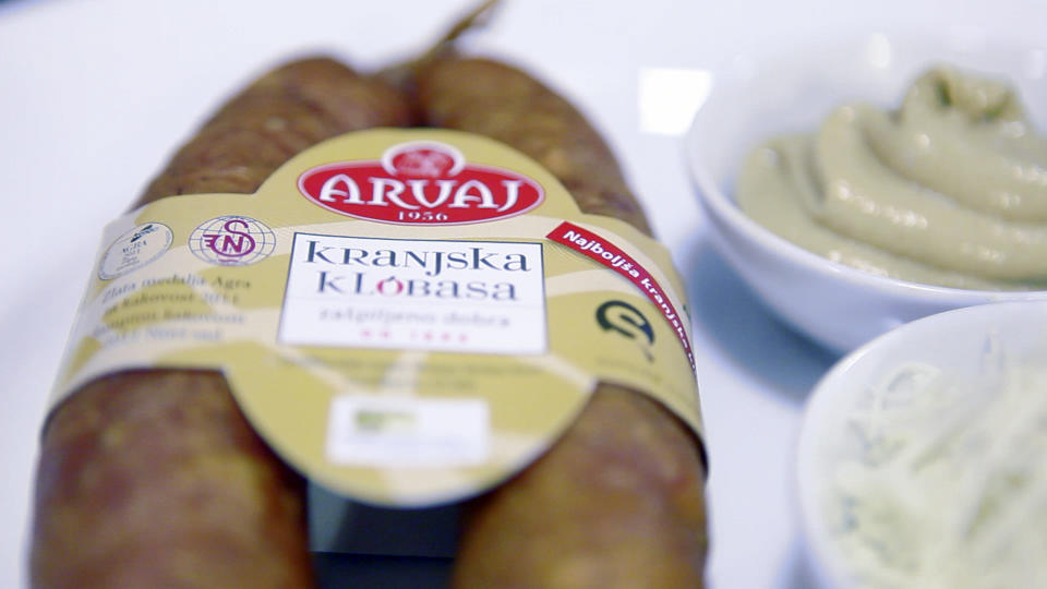 In this photo taken Thursday, April 19, 2012, a pair of "Kranjska" sausages are seen in a restaurant in Ljubljana, Slovenia. Slovenia and Austria are gearing up for a diplomatic battle over a delicacy both countries claim their own, a spicy pork sausage. (AP Photo/Darko Bandic)