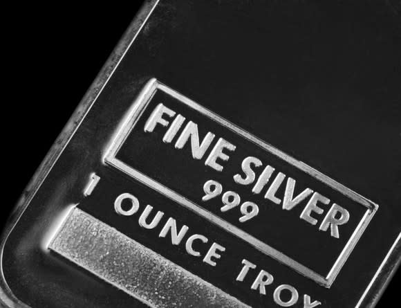 A silver bar on a dark background.