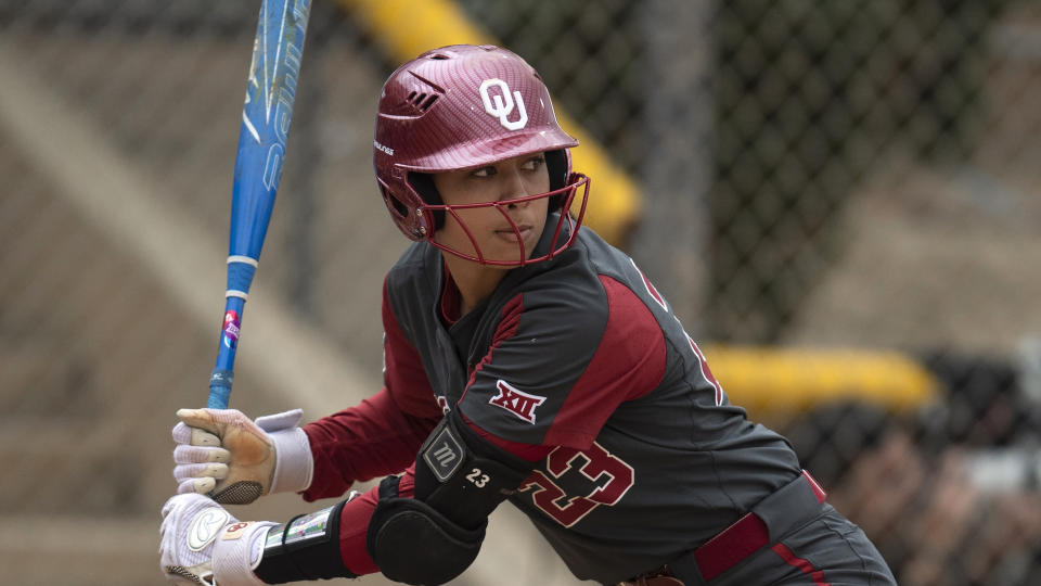 FILE - Oklahoma's Tiare Jennings (23) bats during an NCAA college softball game against Texas A&M on Friday, Feb. 24, 2023, in Cathedral City, Calif. Oklahoma will seek its third straight Women’s College World Series title as the No. 1 national seed in the 64-team NCAA Women’s Softball Tournament. (AP Photo/Kyusung Gong, File)