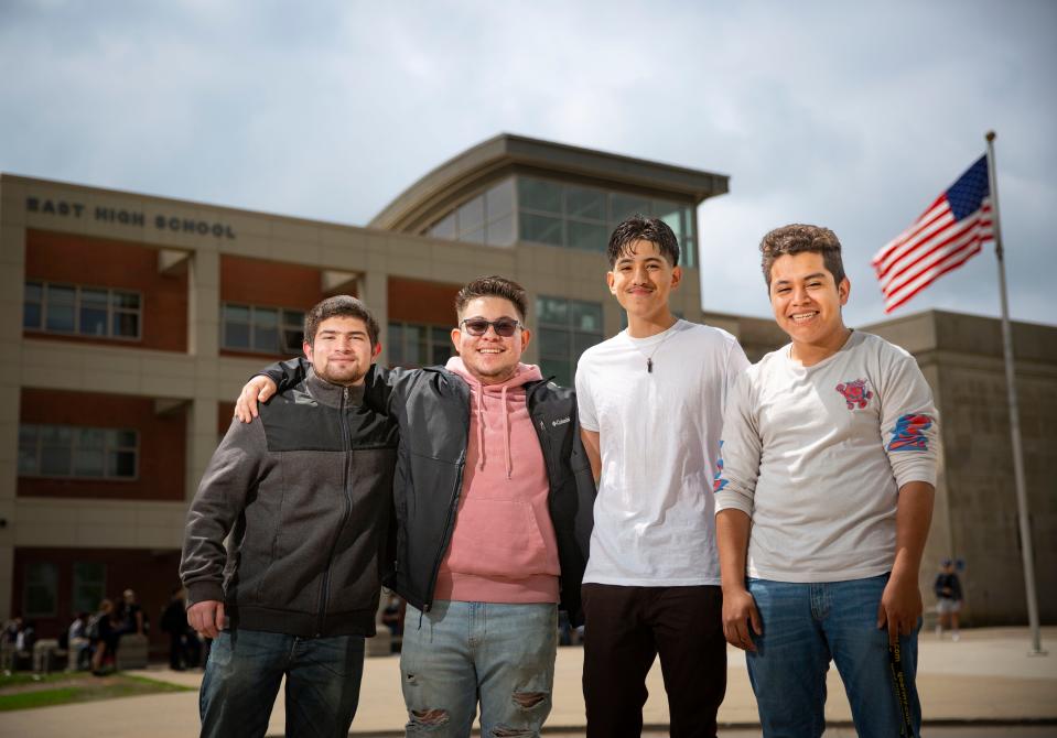 Diego Lopez-Martinez, Steven Magaña, Bryan Robles, and Jesus Aviles DeLeon stand for a photo at East High School in Des Moines on Wednesday, May 18, 2022. The group of friends will be graduating from East this spring.