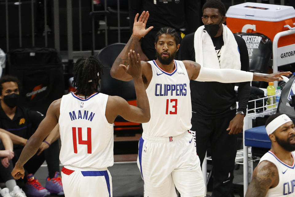 Paul George of the LA Clippers celebrates with Terance Mann 