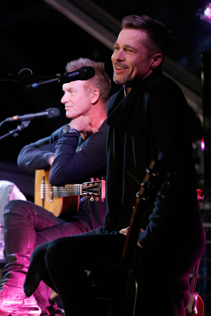 Pitt and Sting make music together at the EBMRF Benefit on Jan. 14, 2017. (Photo: Randy Shropshire/Getty Images for EBMRF)