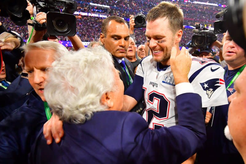 Team owner Robert Kraft (L) promised that no other New England Patriots player would ever again wear Tom Brady's No. 12. File Photo by Kevin Dietsch/UPI