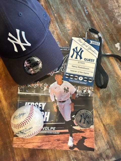 Yankee guest pass, game ball and Veteran of the Game commemorative coin from May 14 ceremony.