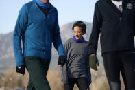 Olympic hopeful Maggie Montoya is shown as she trains with fellow runners at a park on the east side of Boulder, Colo., Friday, April 9, 2021. The Olympic hopeful was working in the pharmacy at the King Soopers supermarket in Colorado on March 22 when 10 people were killed in the mass shooting. (AP Photo/David Zalubowski)