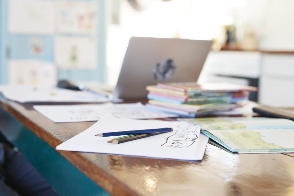 Books and a computer on a desk