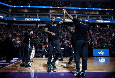 Mar 25, 2018; Sacramento, CA, USA; Boston Celtics forward Al Horford (42) is introduced before the start of the game against the Sacramento Kings at Golden 1 Center. Players from both teams wore t-shirts during warmups in honor of Stephon Clark, a Sacramento native who was recently shot and killed by Sacramento police. Cary Edmondson-USA TODAY Sports