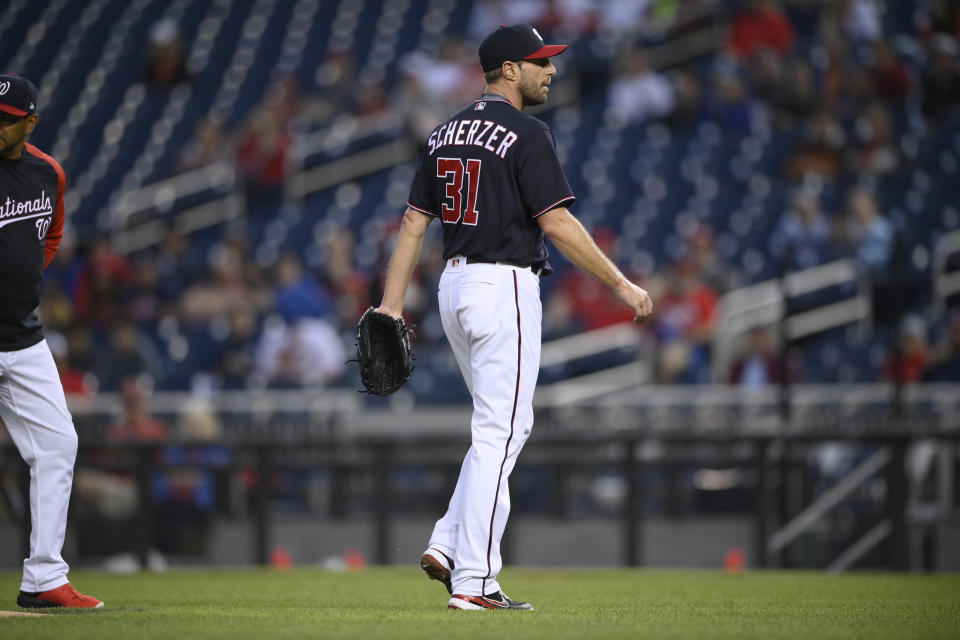 Washington Nationals starting pitcher Max Scherzer (31) leaves the team's baseball game against the San Francisco Giants with an injury during the first inning Friday, June 11, 2021, in Washington. (AP Photo/Nick Wass)