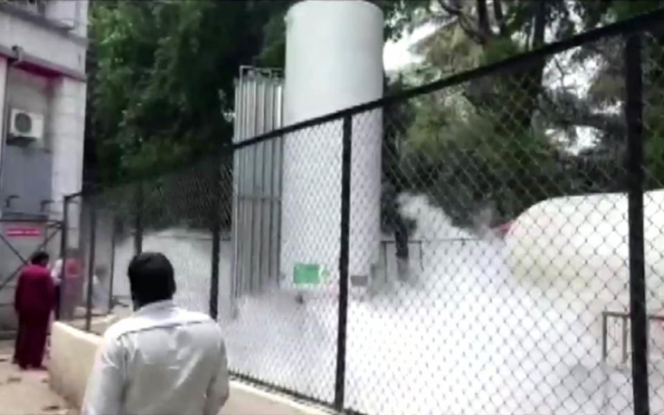 An oxygen tanker leaks at hospital premises where COVID-19 patients died due to lack of oxygen in Nashik, India - ANI / REUTERS