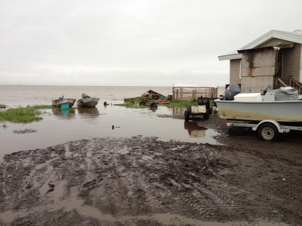 High water laps at the Kivalina shoreline in 2012. The Inupiat community on the Chukchi Sea coast is battered by erosion. (Photo provided by Alaska Division of Community and Regional Affairs)