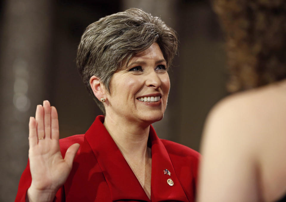 U.S. Senator Joni Ernst is ceremonially sworn-in by VP Biden (not pictured) in the Old Senate Chamber on Capitol Hill in Washington