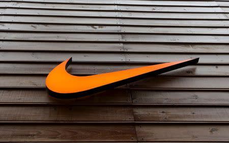 The logo of Nike is seen in a storefront in Sao Paulo May 28, 2015. REUTERS/Paulo Whitaker