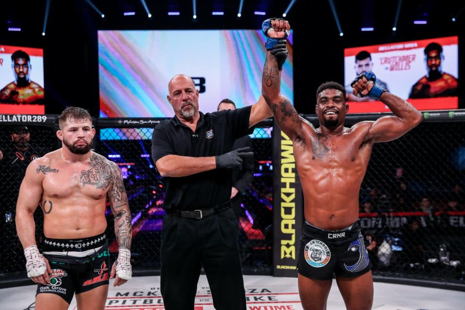 Jaleel Willis celebrates after earning a unanimous decision win over Kyle Crutchmer at Bellator 289.