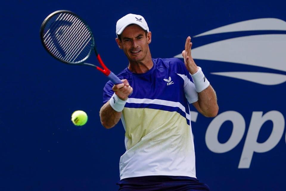 Andy Murray hits a forehand during his victory over Francisco Cerundolo (AP)