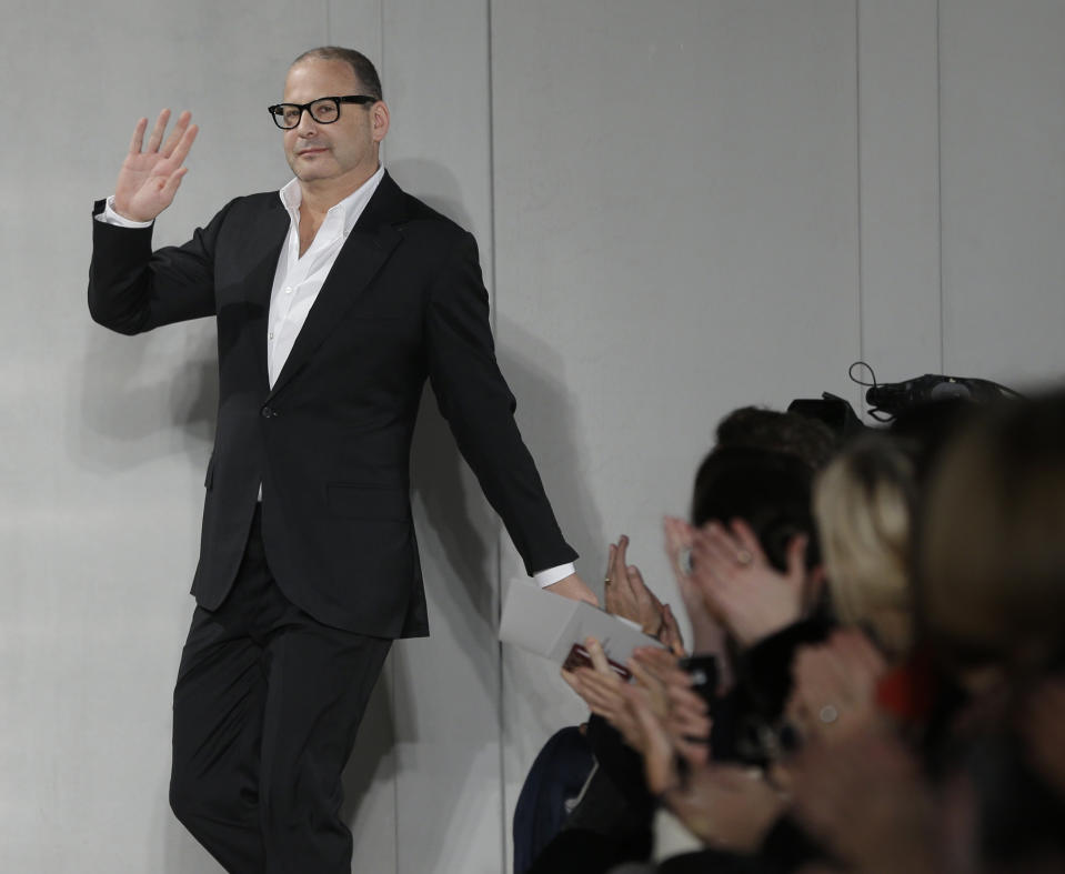 Reed Krakoff greets the crowd after showing hi Fall 2013 collection during Fashion Week in New York, Wednesday, Feb. 13, 2013. (AP Photo/Seth Wenig)