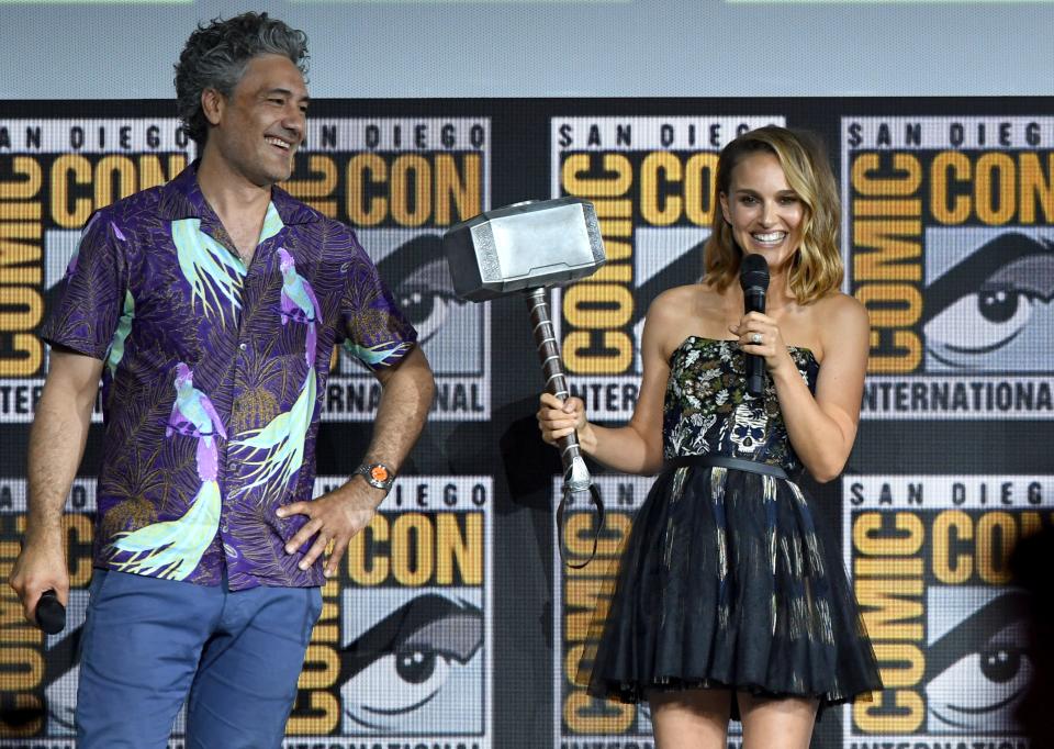 Natalie Portman (with director Taika Waititi) wields the mighty hammer for the fourth 