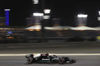 Mercedes driver Lewis Hamilton of Britain steers his car during the qualifying session for Sunday's Bahrain Formula One Grand Prix, at the Bahrain International Circuit in Sakhir, Bahrain, Saturday, March 27, 2021. The Bahrain Formula One Grand Prix will take place on Sunday. (AP Photo/Kamran Jebreili)