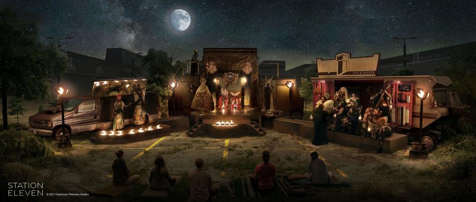 concept art of three stage pieces, unfurling out of cars, creating a set for hamlet. they're set up in a parking lot, and there are warm lights illuminating each of the three pieces. above, there's a shining shy, void of light pollution, and a bright moon.