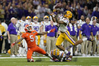 LSU safety Grant Delpit, right, breaks up a pass intended for Clemson wide receiver Tee Higgins during the first half of a NCAA College Football Playoff national championship game Monday, Jan. 13, 2020, in New Orleans. (AP Photo/David J. Phillip)