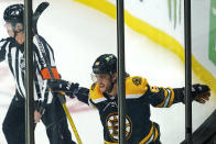 Boston Bruins right wing David Pastrnak (88) celebrates after his goal against the Washington Capitals during the third period of an NHL hockey game, Wednesday, March 3, 2021, in Boston. (AP Photo/Charles Krupa)