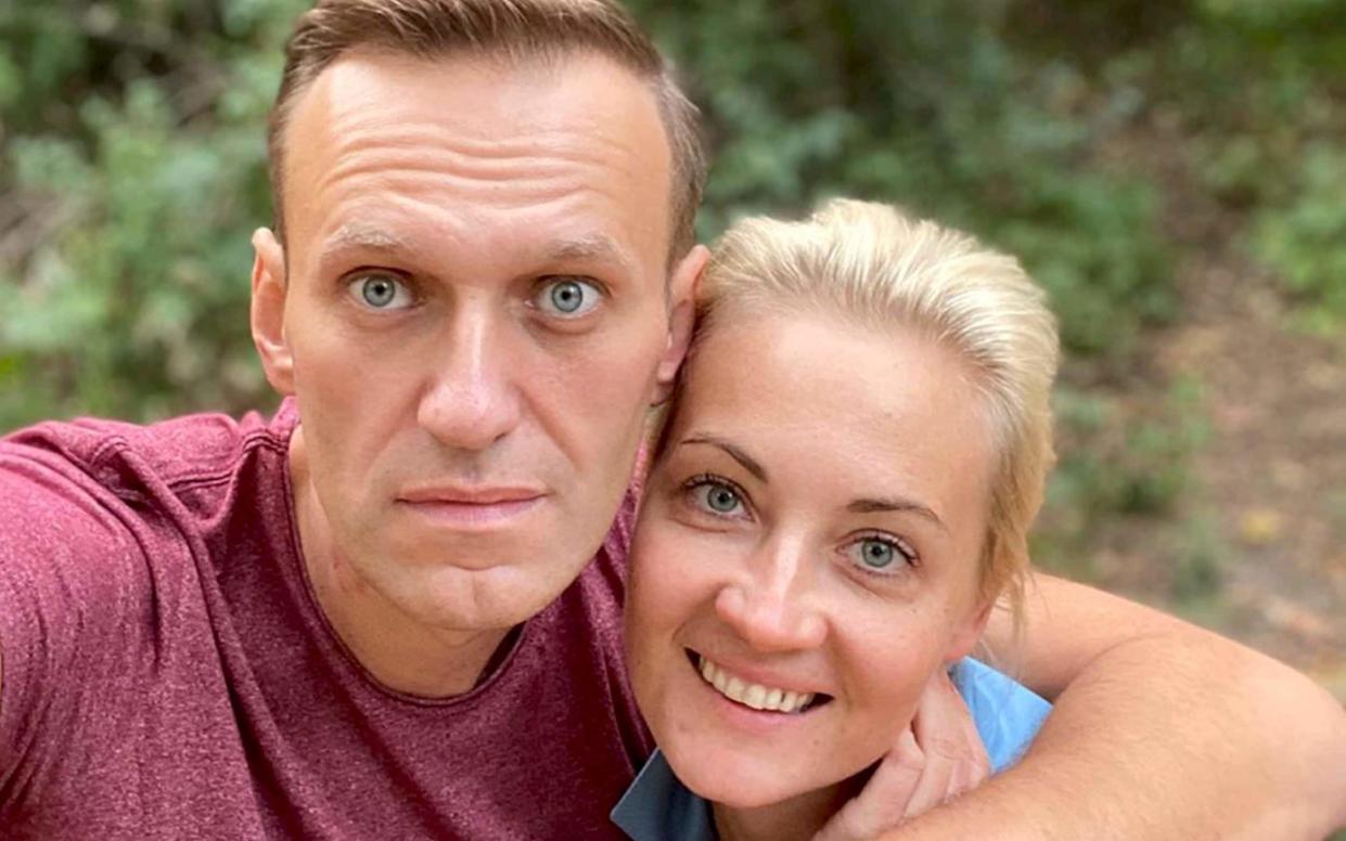 Alexei Navalny, pictured with his wife Yulia says Angela Merkel went to see him and his family on a "private" visit to his Berlin hospital - Navalny Instagram via AP