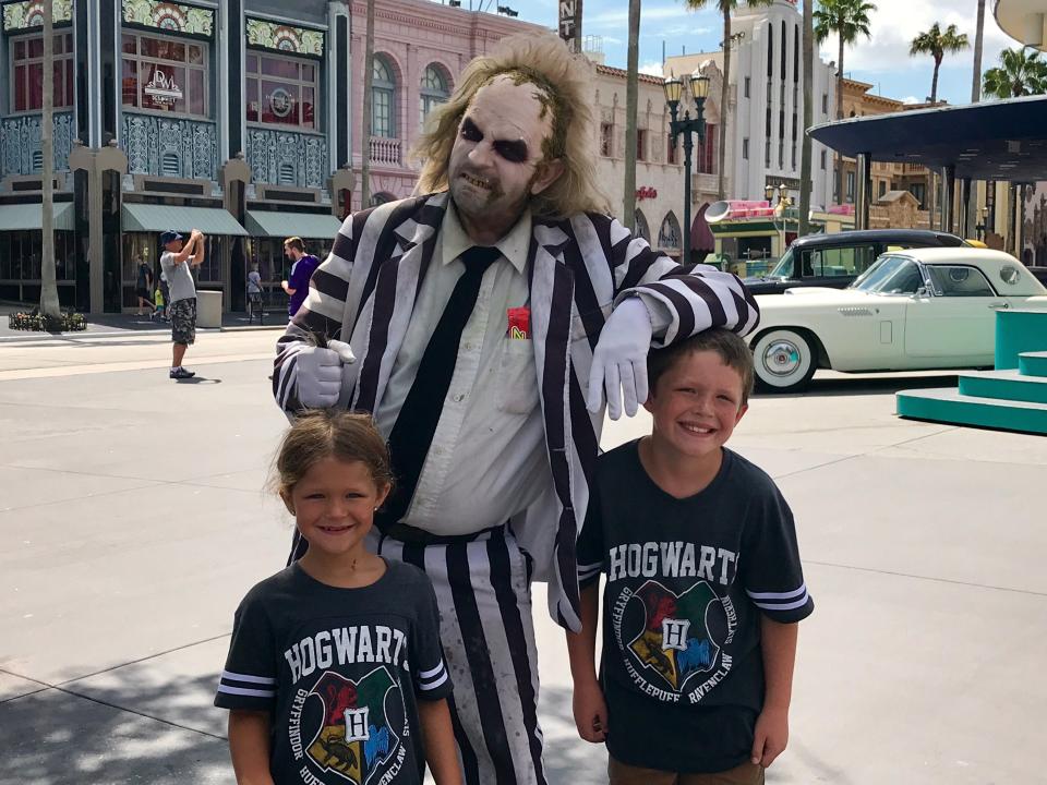 The author's two kids meeting Beetlejuice while at Universal Studios.