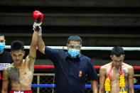 Muaythai boxers return to fight for the first time after temporary suspend due to the spread of the coronavirus disease (COVID-19) in Thailand