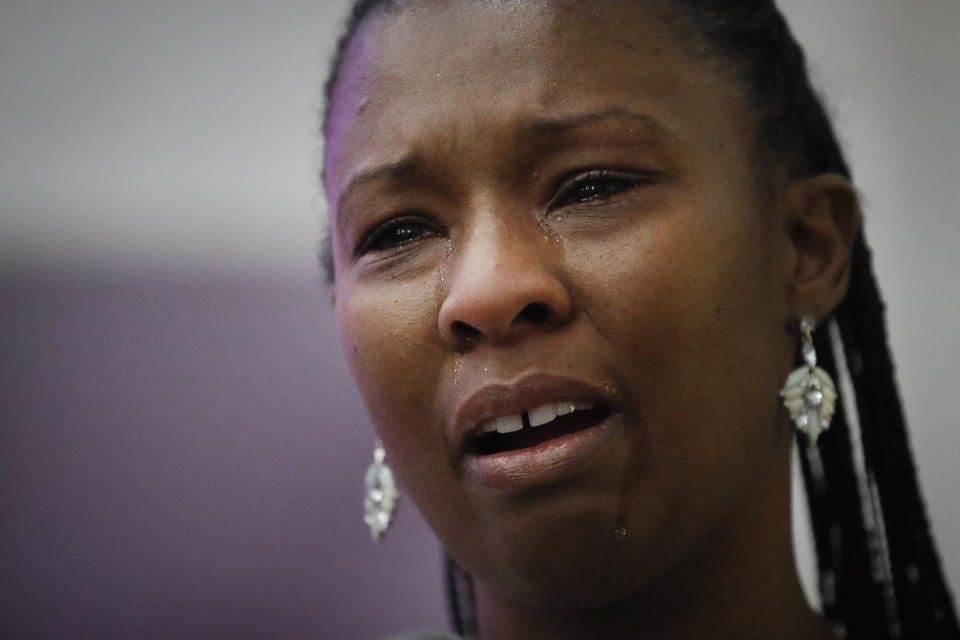 Erika Banks cries as she eulogizes her sister Lydia Nunez, who died from COVID-19, during a funeral service in memory of Nunez at the Metropolitan Baptist Church Tuesday, July 21, 2020, in Los Angeles. (AP Photo/Marcio Jose Sanchez)