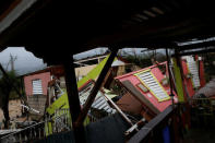 Damaged houses are seen after the area was hit by Hurricane Maria in Guayama, Puerto Rico September 20, 2017. REUTERS/Carlos Garcia Rawlins