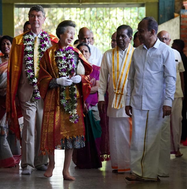 The Princess Royal and her husband Vice Admiral Sir Tim Laurence during their visit to Vajira Pillayar Kovil Hindu temple in Colombo