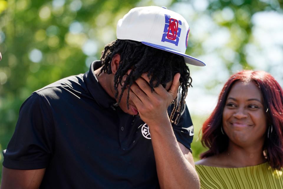 Pistons draft pick guard Jaden Ivey reacts next to his mother Niele Ivey during a news conference Friday, June 24, 2022, in Detroit.