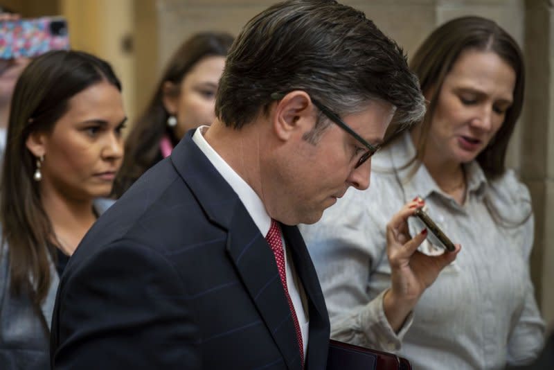 House Speaker Mike Johnson, R-La., returns to his office after the House passed a stopgap spending bill to avoid a partial government shutdown on Thursday. Photo by Bonnie Cash/UPI