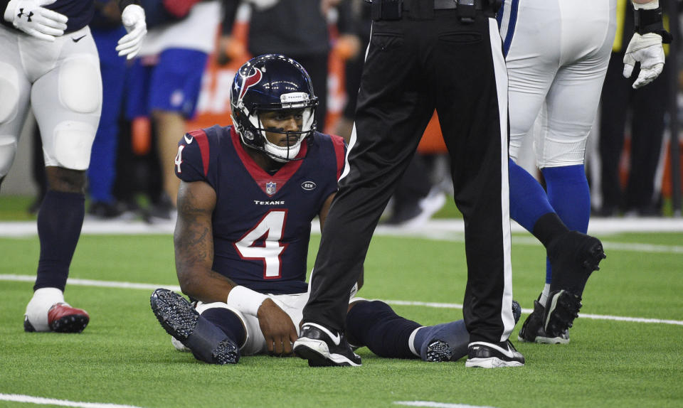 He’s had better days: Texans quarterback Deshaun Watson slumps on the turf after being sacked by the Colts. (AP)