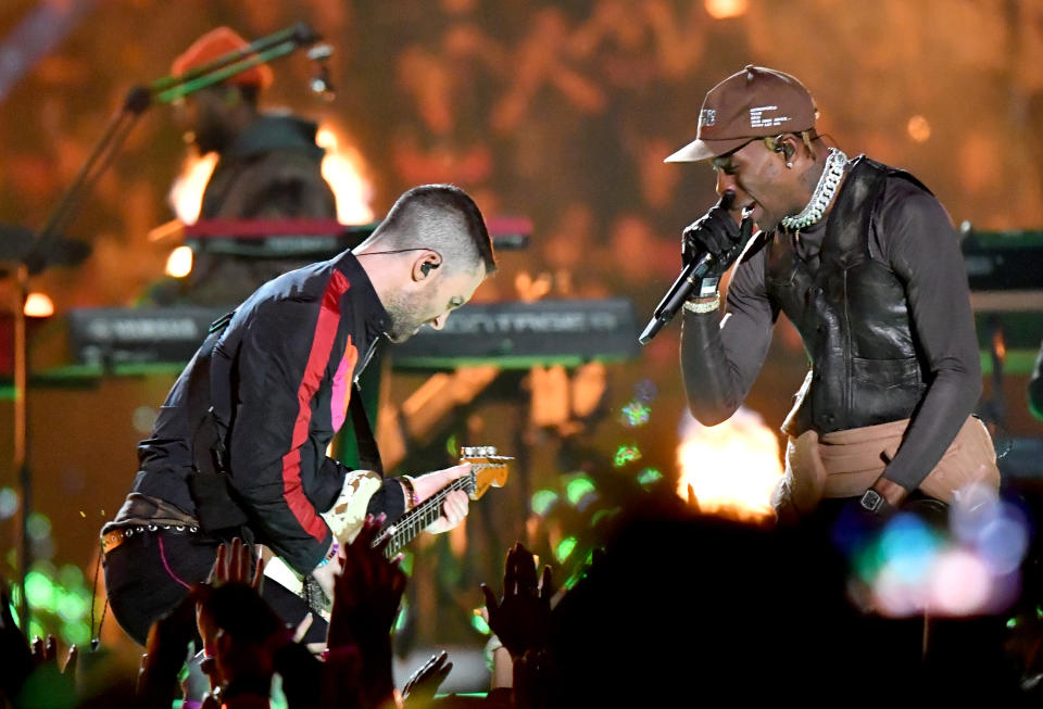 Maroon 5 and Travis Scott onstage at the Super Bowl