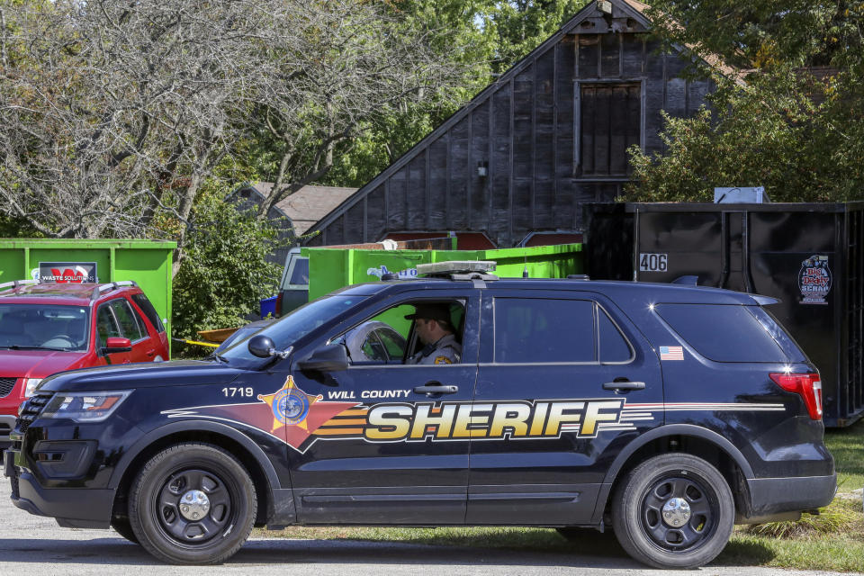 A Will County Sheriff's patrol is stationed outside the home of deceased Dr. Ulrich Klopfer Thursday, Sept. 19, 2019, in Unincorporated Crete, Ill. Illinois authorities on Thursday, Sept. 19, 2019 said that more than 2,200 preserved fetal remains found stacked in the garage of a deceased doctor's home were from abortions performed in Indiana nearly two decades ago and it's up to authorities there to determine if crimes were committed.(AP Photo/Teresa Crawford)