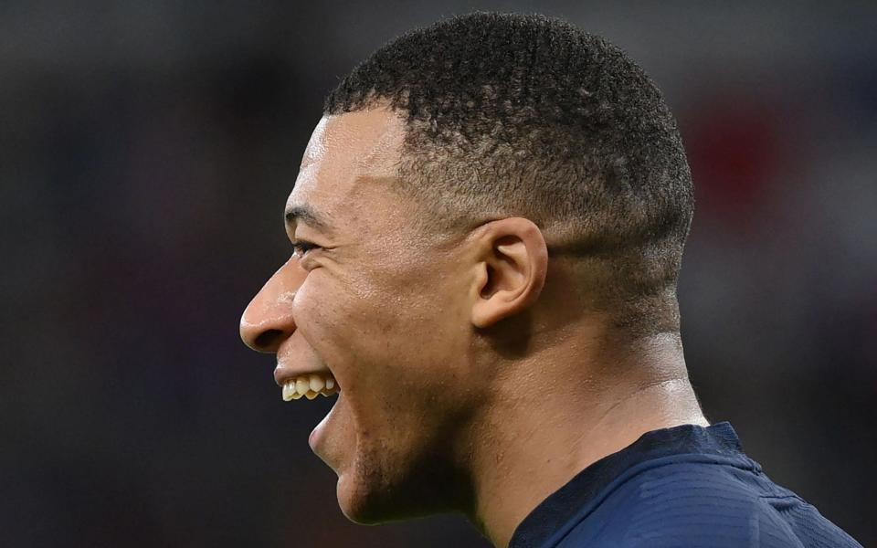 France's forward #10 Kylian Mbappe celebrates after he scored his team's third goal during the Qatar 2022 World Cup round of 16 football match between France and Poland at the Al-Thumama Stadium in Doha on December 4, 2022 - FRANCK FIFE/AFP via Getty Images