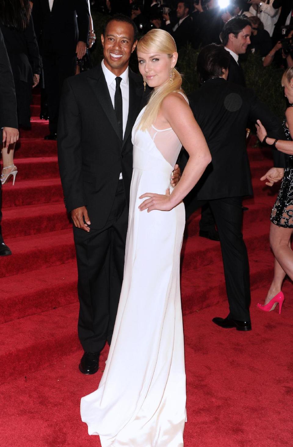 Golfer Tiger Woods and skier Lindsey Vonn attend The Metropolitan Museum of Art's Costume Institute benefit celebrating "PUNK: Chaos to Couture" on Monday May 6, 2013 in New York. (Photo by Evan Agostini/Invision/AP)