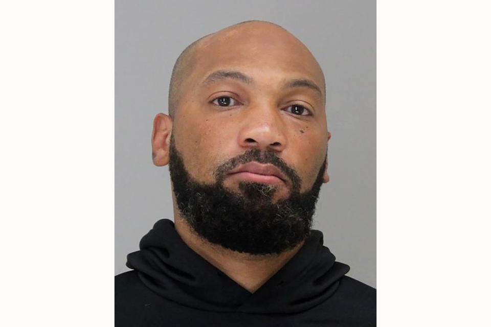This booking photo released by the Dallas County Sheriff's Department, shows Yaqub Salik Talib on Monday, Aug. 15, 2022. Talib, the brother of retired NFL cornerback Aqib Talib, turned himself in to authorities Monday after police identified him as the suspect in the shooting death of a coach at a youth football game in Texas. (Dallas County Sheriff's Department via AP)