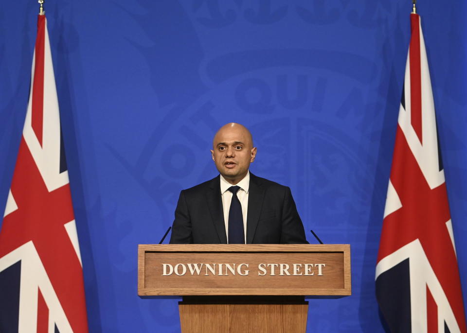 Britain's Health Secretary Sajid Javid speaks during a media briefing in Downing Street, London, Wednesday, Oct. 20, 2021. The U.K. recorded almost 50,000 new infections in a single day this week, and cases have risen 16% from a week earlier. Matthew Taylor, chief executive of health care umbrella group the NHS Confederation, said the health system risks being overwhelmed unless measures are introduced now. (Toby Melville/Pool Photo via AP)