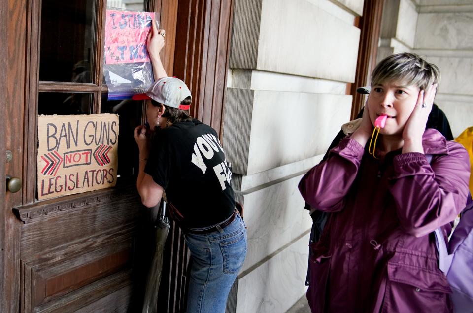 Demonstrators protest the possible expulsion of Justin Jones, D-Nashville, Justin Pearson, D-Memphis and Gloria Johnson, D-Knoxville Knoxville at the State Capitol in Nashville, Tenn., on Thursday, April 6, 2023. 