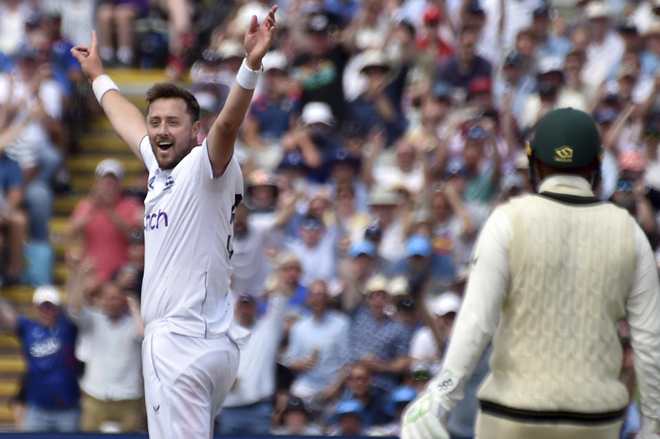 England's Ollie Robinson, left, appeals unsuccessfully for Australia's Travis Head wicket during day two of the first Ashes Test cricket match between England and Australia at Edgbaston, Birmingham, England, Saturday, June 17, 2023. (AP Photo/Rui Vieira)