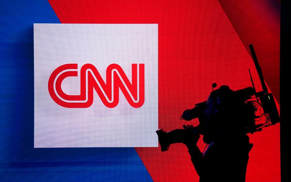 A cameraman with the CNN logo - CNN/Edward M. Pio Roda